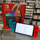 Nintendo Switch OLED with Blue and Red Joy-Con Nintendo Switch